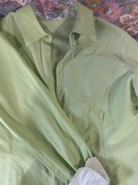 Light green button up collared shirt, women’s large,...
